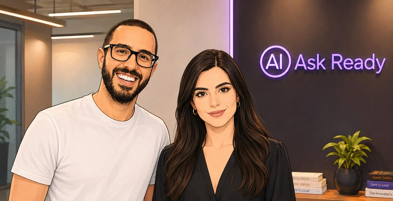 Merve Mia Ozcan and Sercan Topcu, co-founders of AI Ask Ready, standing together in front of an AI Ask Ready sign.